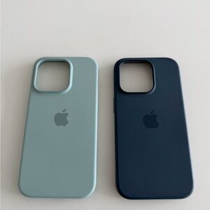 Two Apple iPhone 14 Pro with MagSafe Cases